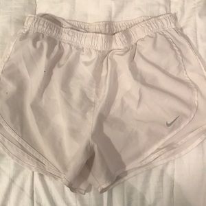 White Nike shorts